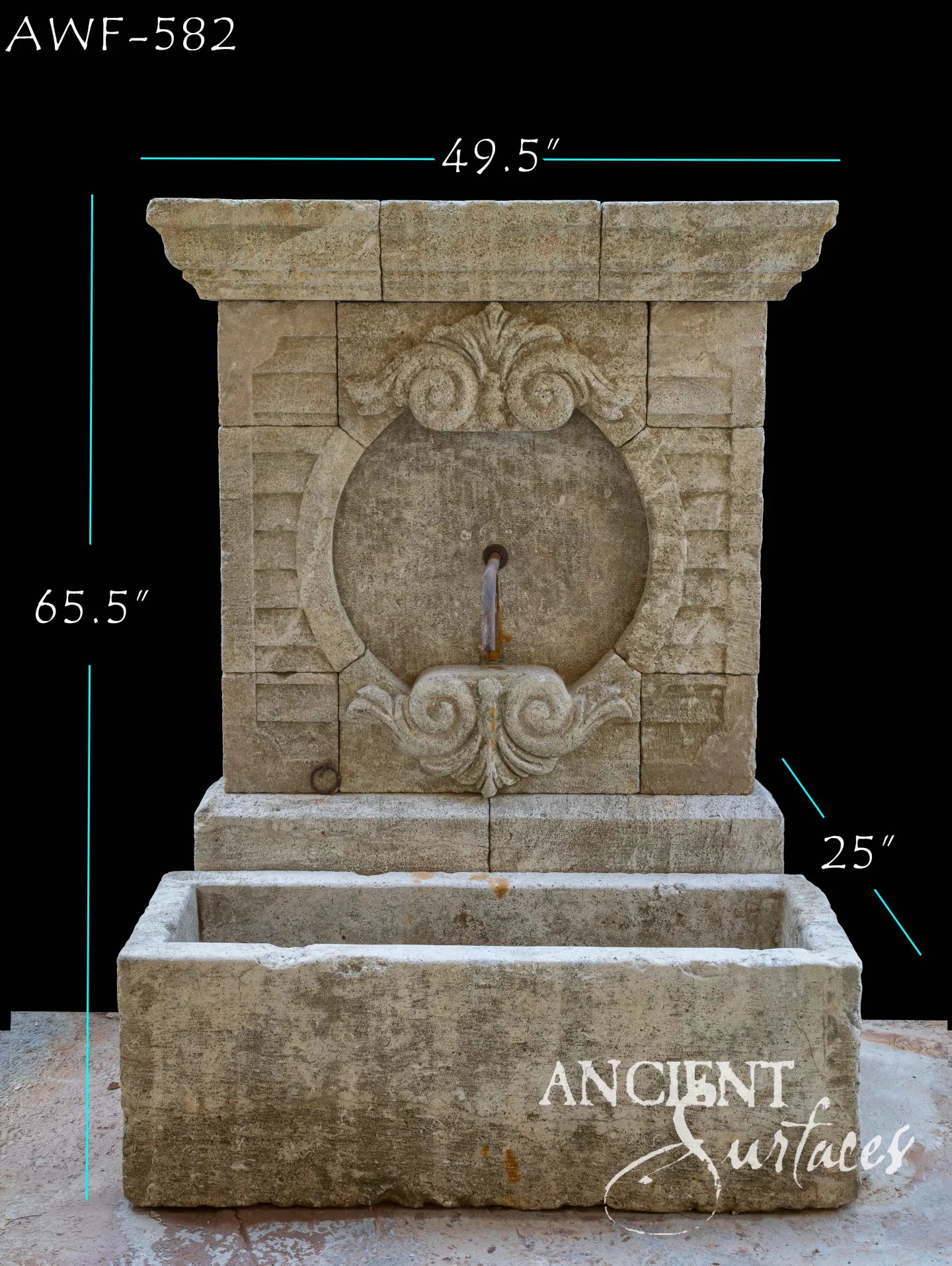 Reclaimed antique limestone wall fountain from Ancient Surfaces catalogued as AWF 582, carved with a round medallion cartouche and acanthus scrolls, 65.5 inches high